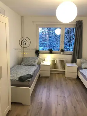 Ein Bett oder Betten in einem Zimmer der Unterkunft Gemütliche Wohnung in Ronsdorf