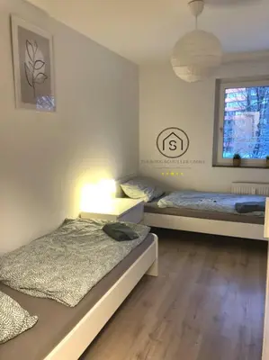 Ein Bett oder Betten in einem Zimmer der Unterkunft Gemütliche Wohnung in Ronsdorf