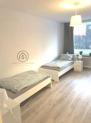 Ein Bett oder Betten in einem Zimmer der Unterkunft Gemütliche Wohnung in Ronsdorf