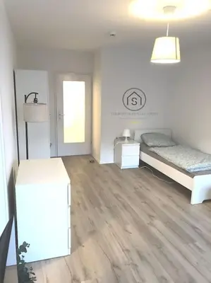 Ein Bett oder Betten in einem Zimmer der Unterkunft Gemütliche Wohnung in Ronsdorf