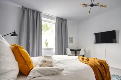 Ein Bett oder Betten in einem Zimmer der Unterkunft SpaceStays Two-Room Suite WIFI Netflix
