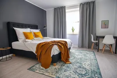 Ein Bett oder Betten in einem Zimmer der Unterkunft SpaceStays Two-Room Suite WIFI Netflix