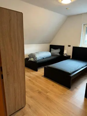 Ein Bett oder Betten in einem Zimmer der Unterkunft Schöne Wohnung mit TV, WLAN und Küche - Anna