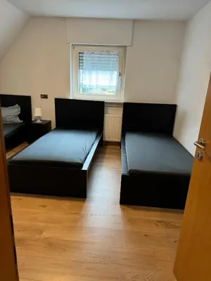 Ein Bett oder Betten in einem Zimmer der Unterkunft Schöne Wohnung mit TV, WLAN und Küche - Anna