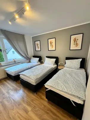 Ein Bett oder Betten in einem Zimmer der Unterkunft Duisburg Flats 24