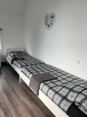 Ein Bett oder Betten in einem Zimmer der Unterkunft Apartments im Herzen von Velbert