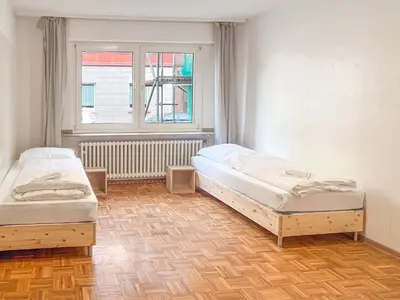 Ein Bett oder Betten in einem Zimmer der Unterkunft T&K Apartments - Duisburg - 3 Zimmer Apartment