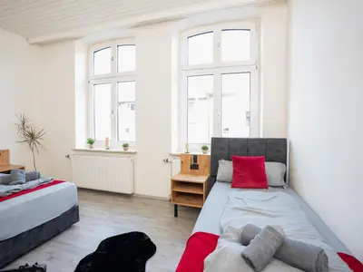 Ein Bett oder Betten in einem Zimmer der Unterkunft Serviceroom24 - Space in Recklinghausen Hoch WLAN - Smart-TV - 24-7 Check-in und Küche