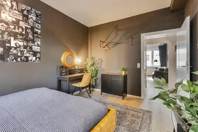 Ein Bett oder Betten in einem Zimmer der Unterkunft Rock trifft Ruhrpott by Cordis Sky für bis zu 3 Personen 5 Minuten zur Messe Essen oder Hauptbahnhof
