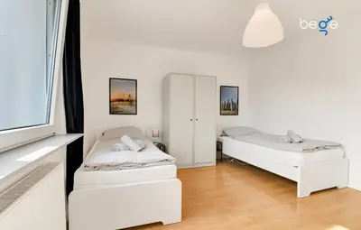 Ein Bett oder Betten in einem Zimmer der Unterkunft BEGE APARTMENTS WorkAway Residence