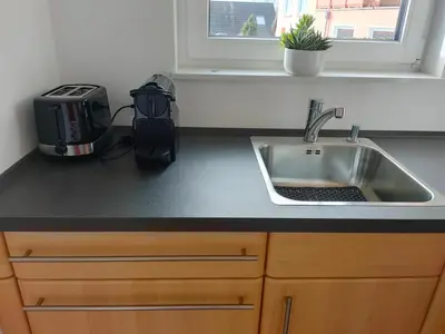 Küche/Küchenzeile in der Unterkunft Modernes Appartement am Eskesberg