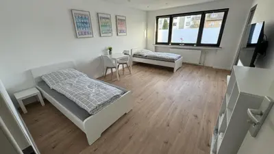 Ein Bett oder Betten in einem Zimmer der Unterkunft Monteur & Messezimmer Heiligenhaus
