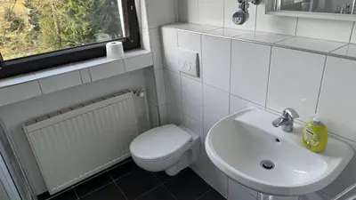 Ein Badezimmer in der Unterkunft Monteur & Messezimmer Heiligenhaus
