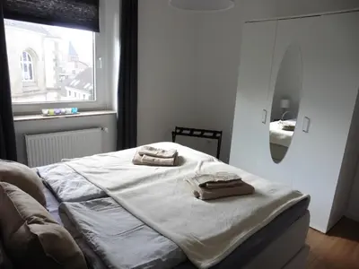 Ein Bett oder Betten in einem Zimmer der Unterkunft Sedan16