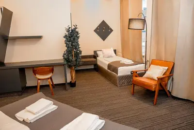 Ein Bett oder Betten in einem Zimmer der Unterkunft Adrett Hotel Königsallee