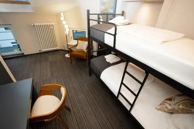 Ein Bett oder Betten in einem Zimmer der Unterkunft Adrett Hotel Königsallee