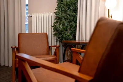 Ein Sitzbereich in der Unterkunft Adrett Hotel Königsallee