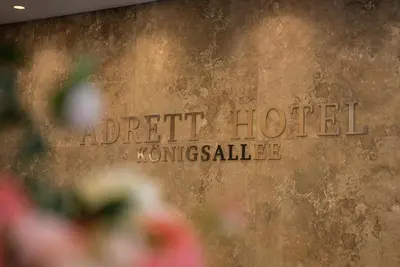 Ein Zertifikat, Auszeichnung, Logo oder anderes Dokument, das in der Unterkunft Adrett Hotel Königsallee ausgestellt ist