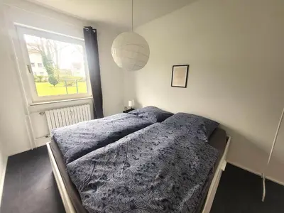 Ein Bett oder Betten in einem Zimmer der Unterkunft Get-your-flat - FeWo 155, 2 Zr Kü & Traum-Retro-Bad, cosy & super sweet, stadtnah & ruhig, Hund nur auf Anfrage,