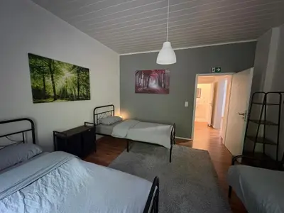 Ein Bett oder Betten in einem Zimmer der Unterkunft Ferienwohnung Obernahmer