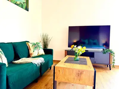 Ein Sitzbereich in der Unterkunft Zuhause im Ruhrgebiet 4 mit Balkon