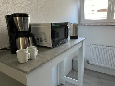 Kaffee-/Teezubehör in der Unterkunft Serene Meadows Apartment