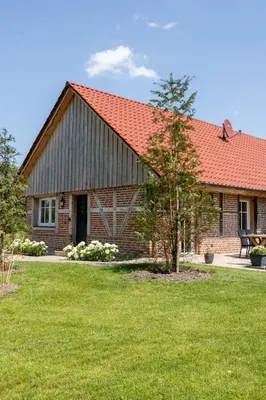 Ein Garten an der Unterkunft Weitblick - Ruhepol in münsterländer Parklandschaft