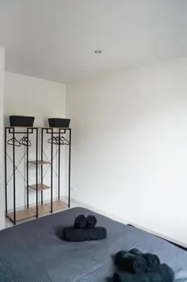 Ein Bett oder Betten in einem Zimmer der Unterkunft Ferienwohnung Hills
