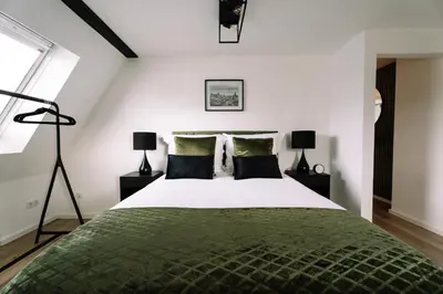 Ein Bett oder Betten in einem Zimmer der Unterkunft Green Flat Düsseldorf 2.0