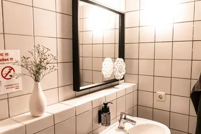 Ein Badezimmer in der Unterkunft CosyHomes24 - Apartment with balcony and parking space - WIT01
