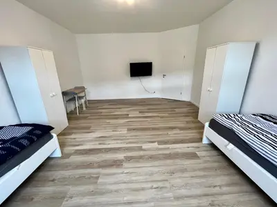 Ein Bett oder Betten in einem Zimmer der Unterkunft Modern Apartment Gelsenkirchen