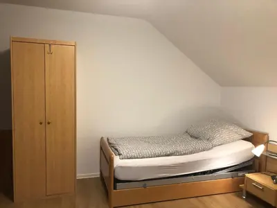 Ein Bett oder Betten in einem Zimmer der Unterkunft 4 Zimmer-Komfortwohnung mit viel Platz in Haltern