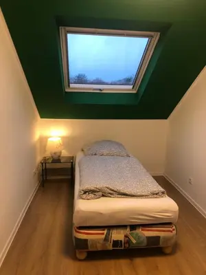 Ein Bett oder Betten in einem Zimmer der Unterkunft 4 Zimmer-Komfortwohnung mit viel Platz in Haltern
