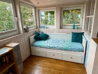 Ein Bett oder Betten in einem Zimmer der Unterkunft Turm auf altem Bauernhof