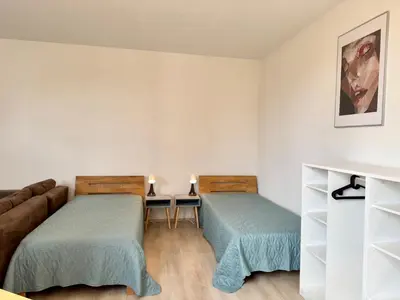 Ein Bett oder Betten in einem Zimmer der Unterkunft 4 Rooms, free Parking, 25 min to Düsseldorf, 100 Mbps WLAN