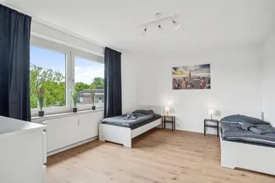 Ein Bett oder Betten in einem Zimmer der Unterkunft Worker Place Gelsenkirchen