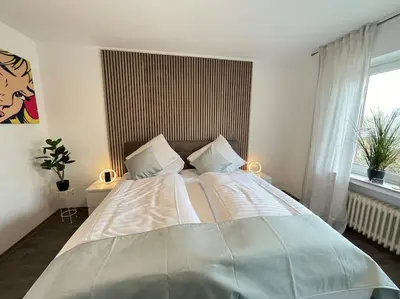 Ein Bett oder Betten in einem Zimmer der Unterkunft Fewo Stever-Aue