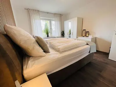 Ein Bett oder Betten in einem Zimmer der Unterkunft Fewo Stever-Aue