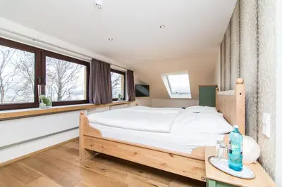 Ein Bett oder Betten in einem Zimmer der Unterkunft Südtiroler Stuben