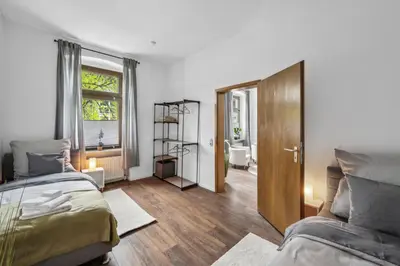 Ein Bett oder Betten in einem Zimmer der Unterkunft Wupper Home II, Top Lage Ideal für Geschäftsleute, Monteure, Familien, 3 Zimmer, Flachbild-TV