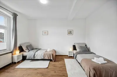 Ein Bett oder Betten in einem Zimmer der Unterkunft Wupper Home II, Top Lage Ideal für Geschäftsleute, Monteure, Familien, 3 Zimmer, Flachbild-TV