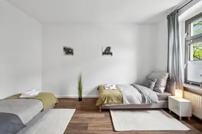 Ein Bett oder Betten in einem Zimmer der Unterkunft Wupper Home II, Top Lage Ideal für Geschäftsleute, Monteure, Familien, 3 Zimmer, Flachbild-TV