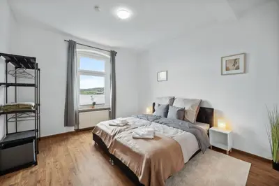 Ein Bett oder Betten in einem Zimmer der Unterkunft Wupper Home II, Top Lage Ideal für Geschäftsleute, Monteure, Familien, 3 Zimmer, Flachbild-TV