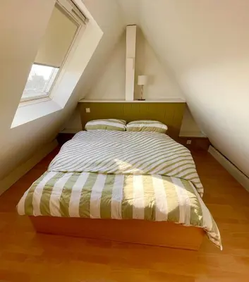 Ein Bett oder Betten in einem Zimmer der Unterkunft Apartment über 2 Etagen nahe BVB-Stadion und Westfalenhallen