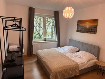 Ein Bett oder Betten in einem Zimmer der Unterkunft Home im Pott - Sehr Zentral - 4 Pers, TV