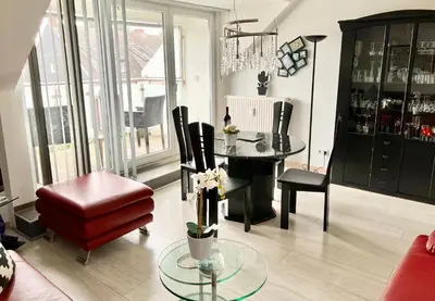 Ein Sitzbereich in der Unterkunft Apartment Orchidee