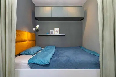 Ein Bett oder Betten in einem Zimmer der Unterkunft City Apartment mit Sonnenbalkon, 10 Minuten zum Bahnhof, 5 Minuten zum Luisenviertel