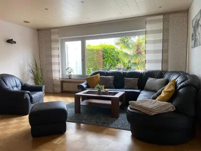 Ein Sitzbereich in der Unterkunft Ferienwohnung mit Garten am Niederrhein