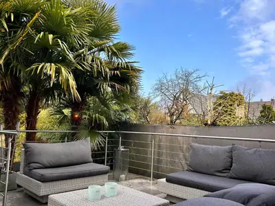 Ein Sitzbereich in der Unterkunft Sonnendeck - Wellness Whirlpool Garden & Grill,125qm