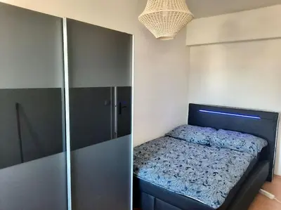 Ein Bett oder Betten in einem Zimmer der Unterkunft City-Wohnung mit Ausblick